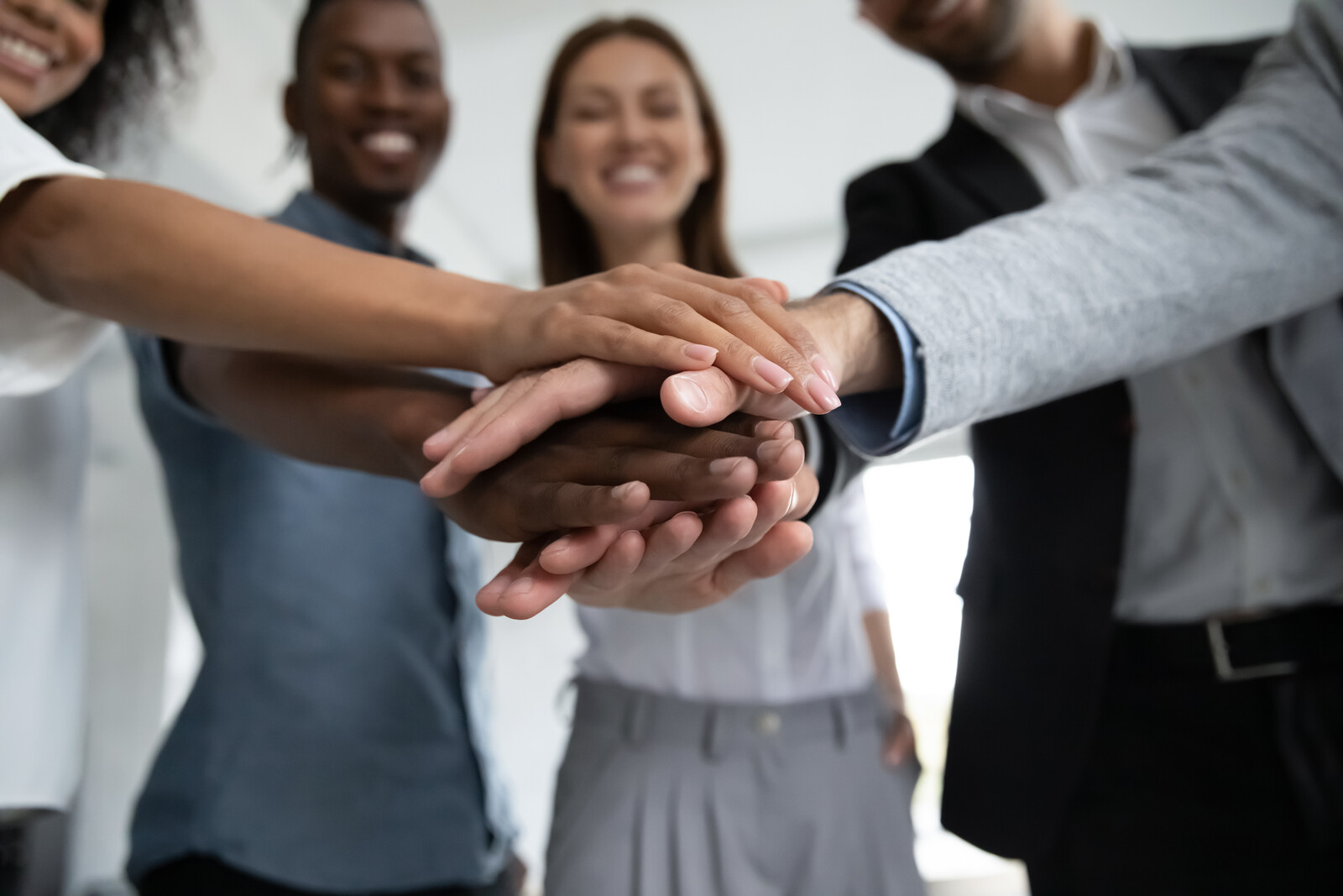 stock photo of people joining hands