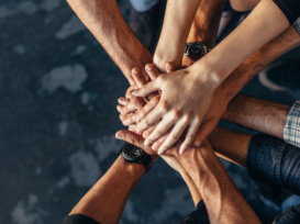 Hands coming together header image