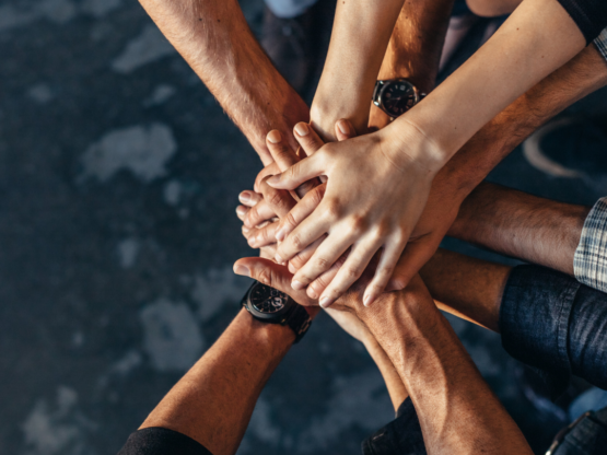 Hands coming together header image