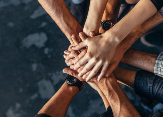 Hands coming together header image